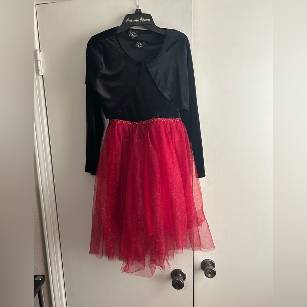 Girls dress size 12. Jacket is not removal.